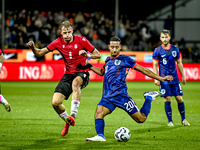 Georgia player Nodari Lominadze and Netherlands player Anass Salah-Eddine during the match between the Netherlands and Georgia at the Covebo...