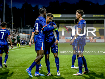 Netherlands players Emmanuel Emegha, Devyne Rensch, and Ruben van Bommel during the match between the Netherlands and Georgia at the Covebo...