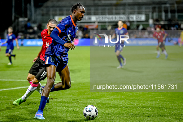 Georgia player Davit Zurabiani and Netherlands player Emmanuel Emegha during the match between the Netherlands and Georgia at the Covebo Sta...