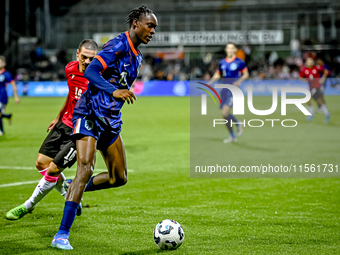 Georgia player Davit Zurabiani and Netherlands player Emmanuel Emegha during the match between the Netherlands and Georgia at the Covebo Sta...