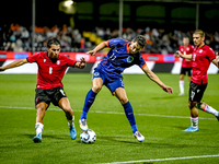 Georgia player Nodari Lominadze and Netherlands player Ruben van Bommel during the match between the Netherlands and Georgia at the Covebo S...