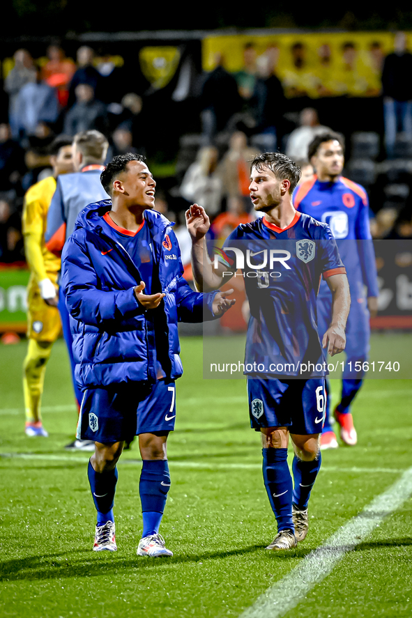 Netherlands player Million Manhoef and Netherlands player Dirk Proper during the match between the Netherlands and Georgia at the Covebo Sta...