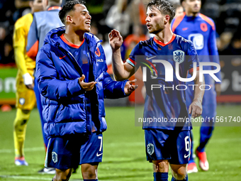 Netherlands player Million Manhoef and Netherlands player Dirk Proper during the match between the Netherlands and Georgia at the Covebo Sta...