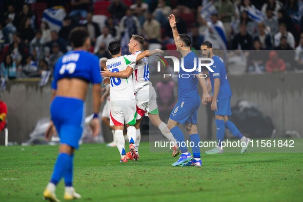 Davide Frattesi celebrates his goal with teammates during the UEFA Nations League 2024/25 League A Group A2 match between Israel and Italy a...