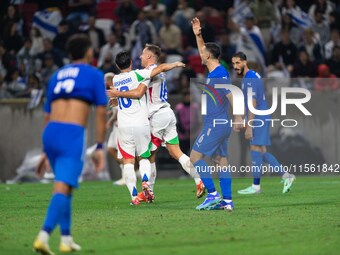 Davide Frattesi celebrates his goal with teammates during the UEFA Nations League 2024/25 League A Group A2 match between Israel and Italy a...