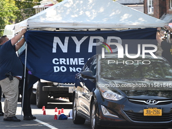 Crime scene investigators investigate the scene, place evidence markers, and search for clues after a 46-year-old male is shot multiple time...