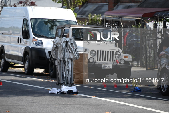 Crime scene investigators investigate the scene, place evidence markers, and search for clues after a 46-year-old male is shot multiple time...