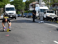 Crime scene investigators investigate the scene, place evidence markers, and search for clues after a 46-year-old male is shot multiple time...