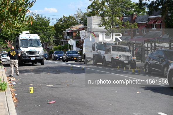 Crime scene investigators investigate the scene, place evidence markers, and search for clues after a 46-year-old male is shot multiple time...