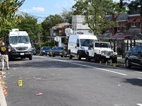 Crime scene investigators investigate the scene, place evidence markers, and search for clues after a 46-year-old male is shot multiple time...