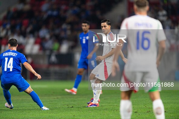 Giacomo Raspadori of Italy is in action during the UEFA Nations League 2024/25 League A Group A2 match between Israel and Italy at Bozsik Ar...