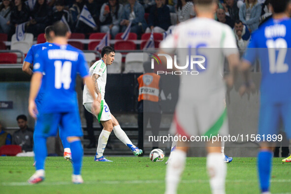 Alessandro Bastoni of Italy is in action during the UEFA Nations League 2024/25 League A Group A2 match between Israel and Italy at Bozsik A...