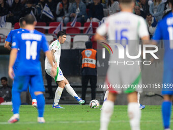 Alessandro Bastoni of Italy is in action during the UEFA Nations League 2024/25 League A Group A2 match between Israel and Italy at Bozsik A...