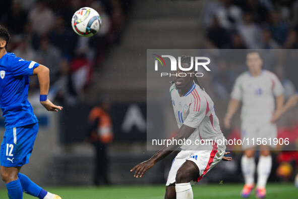 Moise Kean of Italy is in action during the UEFA Nations League 2024/25 League A Group A2 match between Israel and Italy at Bozsik Arena Sta...