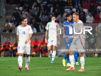 Alessandro Bastoni of Italy is in action during the UEFA Nations League 2024/25 League A Group A2 match between Israel and Italy at Bozsik A...