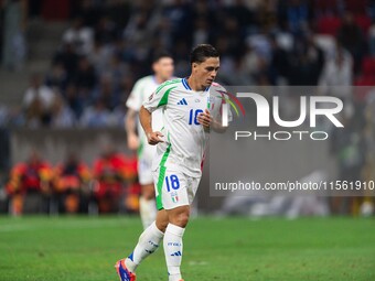 Giacomo Raspadori of Italy is in action during the UEFA Nations League 2024/25 League A Group A2 match between Israel and Italy at Bozsik Ar...