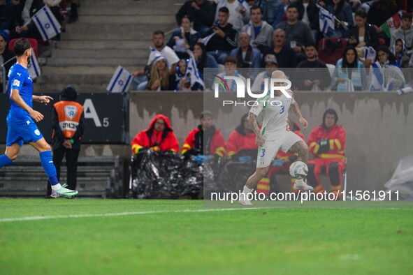 Federico Di Marco of Italy is in action during the UEFA Nations League 2024/25 League A Group A2 match between Israel and Italy at Bozsik Ar...