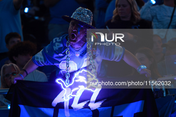 DETROIT,MICHIGAN-SEPTEMBER 8: Detroit Lions fan cheers during the first half of an NFL football game between the Los Angeles Rams and the De...