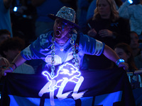 DETROIT,MICHIGAN-SEPTEMBER 8: Detroit Lions fan cheers during the first half of an NFL football game between the Los Angeles Rams and the De...