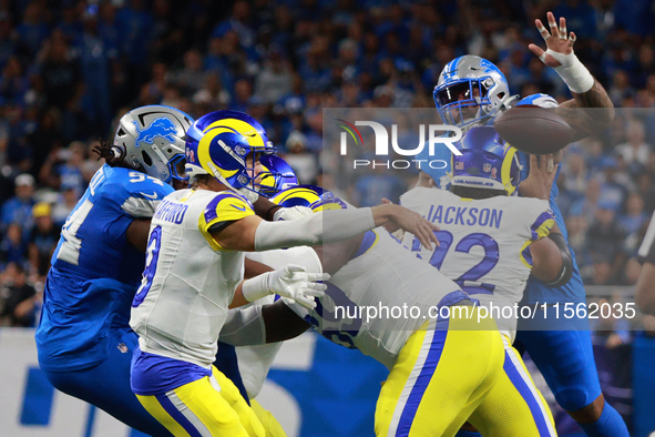 DETROIT,MICHIGAN-SEPTEMBER 8: Los Angeles Rams quarterback Matthew Stafford (9) throws a pass during the first half of an NFL football game...