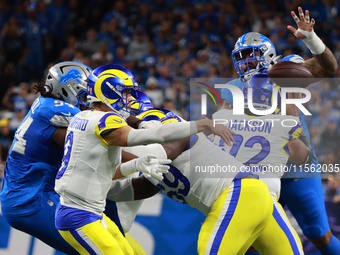 DETROIT,MICHIGAN-SEPTEMBER 8: Los Angeles Rams quarterback Matthew Stafford (9) throws a pass during the first half of an NFL football game...