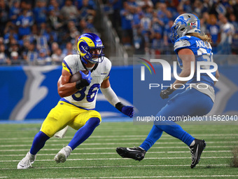 DETROIT,MICHIGAN-SEPTEMBER 8: Los Angeles Rams tight end Colby Parkinson (86) runs the ball against Detroit Lions linebacker Alex Anzalone (...