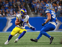 DETROIT,MICHIGAN-SEPTEMBER 8: Los Angeles Rams tight end Colby Parkinson (86) runs the ball against Detroit Lions linebacker Alex Anzalone (...