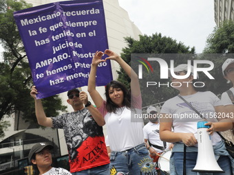 Judiciary workers shout slogans against the Judicial Reform proposed by current President Andres Manuel Lopez Obrador while demonstrating ou...