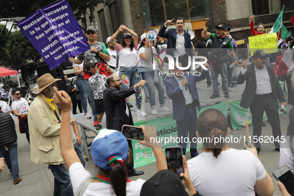 Judiciary workers shout slogans against the Judicial Reform proposed by current President Andres Manuel Lopez Obrador while demonstrating ou...