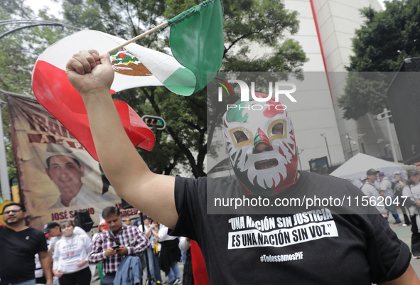 A judiciary worker shouts slogans against the judicial reform proposed by current President Andres Manuel Lopez Obrador while demonstrating...