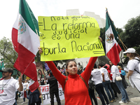 A judiciary worker shouts slogans against the judicial reform proposed by current President Andres Manuel Lopez Obrador while demonstrating...