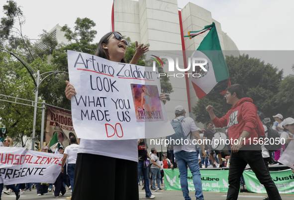 A judiciary worker shouts slogans against the judicial reform proposed by current President Andres Manuel Lopez Obrador while demonstrating...