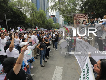 Judiciary workers shout slogans against the Judicial Reform proposed by current President Andres Manuel Lopez Obrador while demonstrating ou...