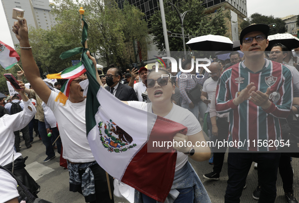 A judiciary worker shouts slogans against the judicial reform proposed by current President Andres Manuel Lopez Obrador while demonstrating...