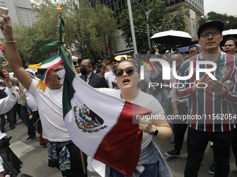 A judiciary worker shouts slogans against the judicial reform proposed by current President Andres Manuel Lopez Obrador while demonstrating...