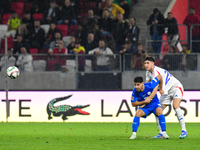 Alessandro Bastoni and Manor Solomon are in action during Israel vs Italy: matchday 2 of UEFA Nations League 2024-2025, at Bozsik Arena in B...