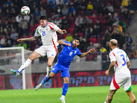 Alessandro Bastoni and Manor Solomon are in action during Israel vs Italy, matchday 2 of the UEFA Nations League 2024-2025, in Budapest, Hun...