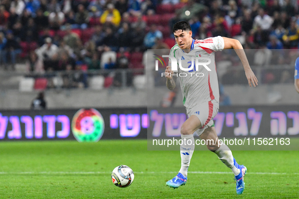 Alessandro Bastoni is in action during Israel vs Italy: matchday 2 of UEFA Nations League 2024-2025, in Budapest, Hungary, on September 9, 2...