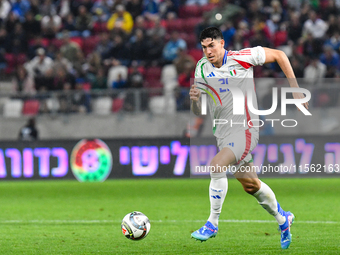 Alessandro Bastoni is in action during Israel vs Italy: matchday 2 of UEFA Nations League 2024-2025, in Budapest, Hungary, on September 9, 2...