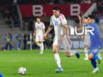 Alessandro Bastoni and Manor Solomon are in action during Israel vs Italy, matchday 2 of the UEFA Nations League 2024-2025, in Budapest, Hun...