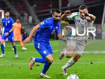 Alessandro Buongiorno and Mahmoud Jaber are in action during Israel vs. Italy, matchday 2 of the UEFA Nations League 2024-2025, in Budapest,...