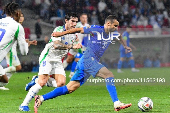 Sandro Tonali and Mahmoud Jaber are in action during Israel vs Italy: matchday 2 of the UEFA Nations League 2024-2025, at Bozsik Arena in Bu...