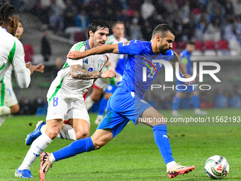 Sandro Tonali and Mahmoud Jaber are in action during Israel vs Italy: matchday 2 of the UEFA Nations League 2024-2025, at Bozsik Arena in Bu...