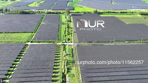 Solar photovoltaic panels are seen in Lihua Village in Lianyungang, China, on September 10, 2024. 