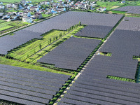 Solar photovoltaic panels are seen in Lihua Village in Lianyungang, China, on September 10, 2024. (