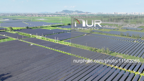 Solar photovoltaic panels are seen in Lihua Village in Lianyungang, China, on September 10, 2024. 