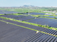 Solar photovoltaic panels are seen in Lihua Village in Lianyungang, China, on September 10, 2024. (