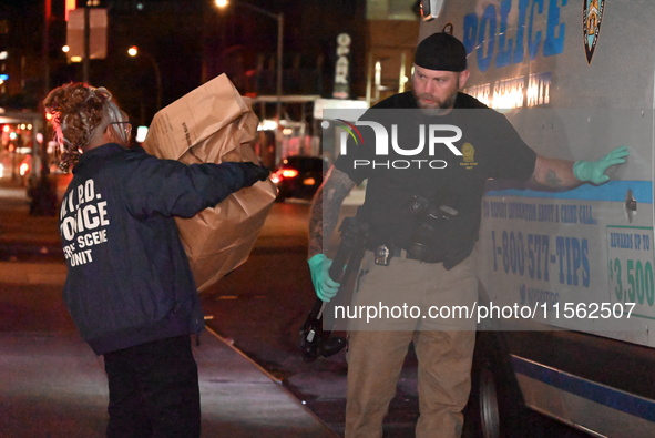 Crime scene investigators collect evidence, search for clues, and investigate the shooting death of 57-year-old Ying Zhu Liu, who is shot in...