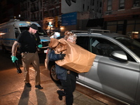 Crime scene investigators collect evidence, search for clues, and investigate the shooting death of 57-year-old Ying Zhu Liu, who is shot in...