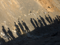 People inspect the site following Israeli strikes on a tent camp sheltering displaced people amid the Israel-Hamas conflict in the Al-Mawasi...